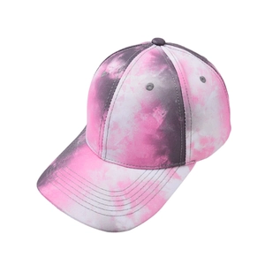 Detail of pink and grey tie-dye baseball cap with curved brim and durable cotton fabric