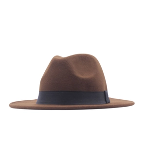 Detail view of a brown wool felt wide brim fedora hat with a stylish dark band ribbon