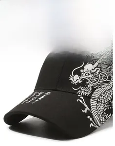 Detail of silver dragon pattern and white calligraphy on black cotton baseball cap