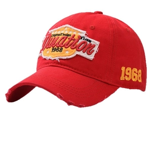 Vintage red cotton baseball cap with distressed details and 1968 embroidery patches
