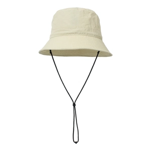 Detail of beige bucket hat featuring adjustable black drawstring and reinforced brim stitching