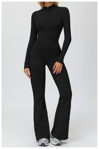 Close-up of black fleece-lined yoga jumpsuit featuring a half-zip stand collar and flared legs