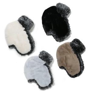 Detail of four faux fur ushanka hats in cream, black, gray, and brown for winter