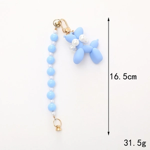 Light blue balloon dog pendant with blue and white beads chain on white background