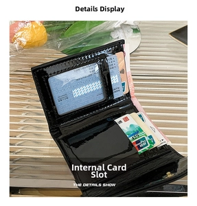 Detailed view of the black glossy wallet featuring multiple card slots and clear ID window