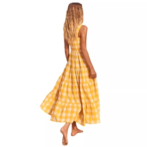 Sleek backless yellow and white checkered tiered summer maxi dress with thin straps