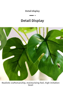 Close-up of realistic faux monstera leaves with natural holes and moisturizing texture