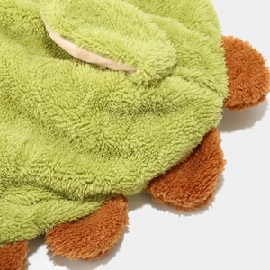Cute green plush dinosaur hat with ear flaps for winter warmth and funny cartoon style