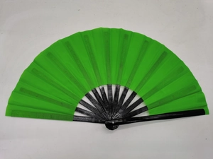 Detailed top view of a vibrant green fabric folding fan with black bamboo ribs
