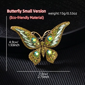 Macro shot of green crystal butterfly brooch with golden alloy base and detailed dimensions