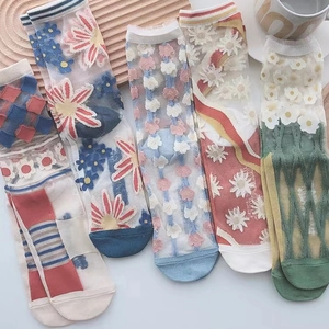 Breathable sheer mesh crew socks with colorful floral embroidery and striped patterns