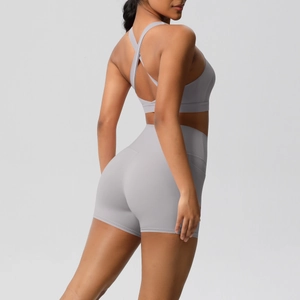 Back view of a seamless two-piece yoga set with racerback bra and high-waist shorts