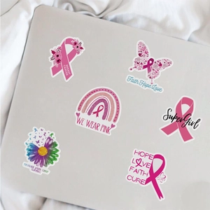 Pink breast cancer awareness stickers on silver laptop featuring waterproof PVC material