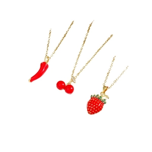 Chic red cherry, strawberry, and chili pendant necklaces on elegant gold chains