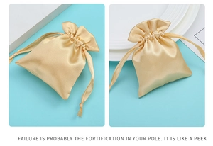 Close-up of champagne satin drawstring jewelry pouch with smooth silk texture