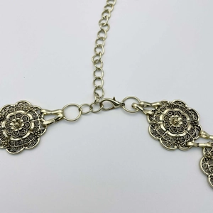 Vintage gold hollow flower western waist chain belt with intricate metal floral carvings