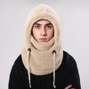 Close-up of beige fleece balaclava hood featuring thick plush texture and adjustable drawstrings