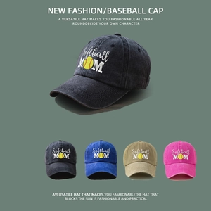 Detail view of Softball MOM embroidery on washed baseball caps in multiple colors