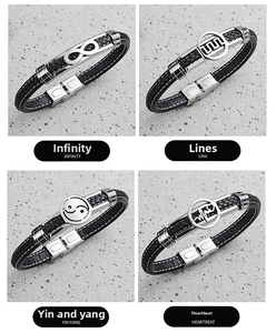 Detail showing four styles of men's braided leather bracelets with stainless steel charms