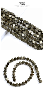 Macro view of natural pyrite cube beads strand with metallic luster for jewelry making