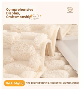 Detail of plush cream sofa cushion showing quilted square texture and reinforced edges