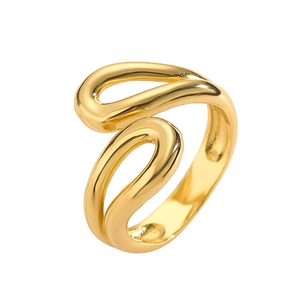 Detailed view of adjustable golden ring with polished wavy irregular fluid lines