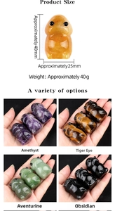 Size chart showing 40mm natural amethyst and tiger eye gemstone monster figurines