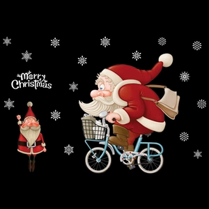 Sticker mural Joyeux Noël avec Père Noël à vélo et flocons de neige sur fond noir intense