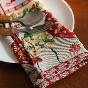 American retro Christmas table runner with festive jacquard trees and holly pattern decor
