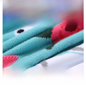 Detail of premium combed cotton fabric with colorful patterns on crew socks