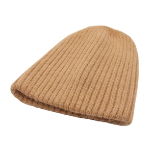 Winter knitted beanie hat in camel brown with ribbed texture and warm fuzzy finish