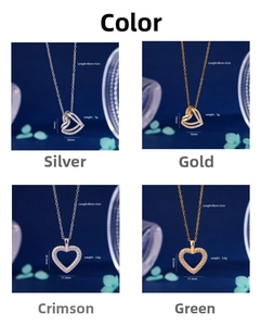 Vue détaillée des pendentifs cœur sertis de zircons en argent et or avec spécifications