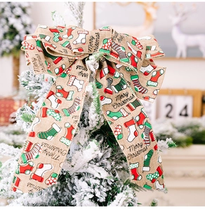 Linen Christmas tree bow with reindeer and Merry Christmas text detail