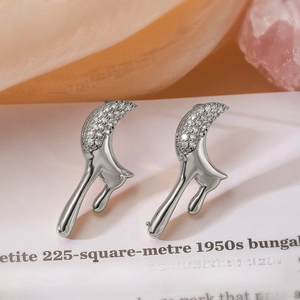 Modern gold-plated star and moon stud earrings with sparkling cubic zirconia inlay