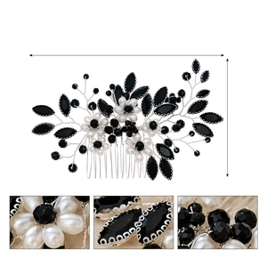 Detail view of handmade bridal hair comb with black rhinestones and white pearls