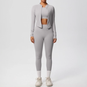 Detailed view of women's 3-piece fitness set with zip jacket and high-waist leggings