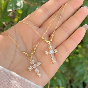 18K gold plated necklace set with seashell cross pendants and pearl details