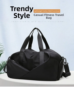 Detail of multi-functional black sports bag with separate wet-dry compartment and strap