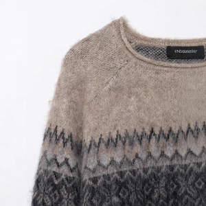 Fuzzy mohair knit sweater featuring a grey gradient jacquard pattern and a crew neck