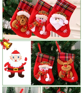 Detailed view of assorted Christmas stockings featuring Santa, snowman, and reindeer motifs