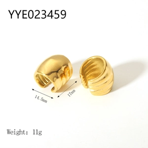Detailed view of 18K gold plated stainless steel chunky hoop earrings with wavy texture