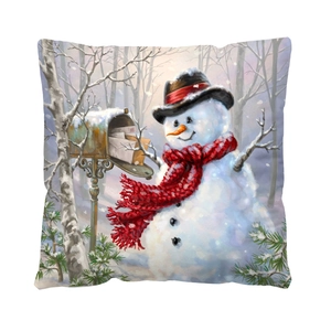 Detailed close-up of a decorative holiday pillowcase featuring a festive winter snowman illustration