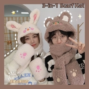 Detail of three-in-one winter plush hat scarf and gloves set with cute bear ear design