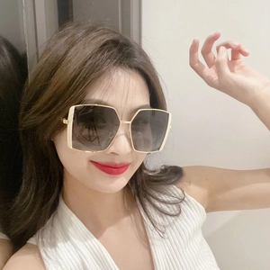 Women's oversized square polarized sunglasses with gold metal frame and gradient lenses