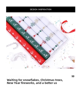 Christmas wrapping paper detail showing festive reindeer and snowflake prints on colored rolls