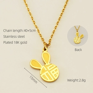Detail showing 18K gold plated rabbit pendant with Chinese character engraving and back view