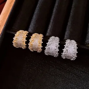 Luxurious 14K gold and silver plated pave hoop earrings with sparkling crystals