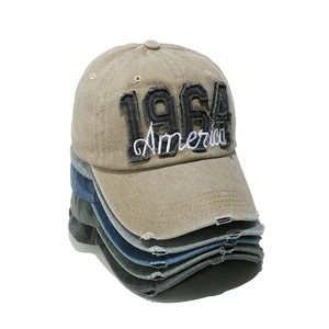 Washed denim baseball cap with 1964 America embroidery in vintage distressed street style