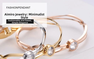 Detailed view of silver, gold, and rose gold twisted bangles with a centered round zircon