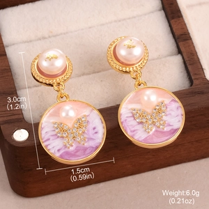 Detailed view of floral baroque pearl earrings with dimensions 3.0cm by 1.5cm and 6g weight